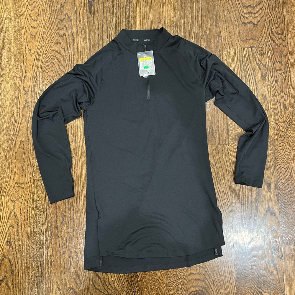 Men’s Nike black half zip - never worn with tags - size small
